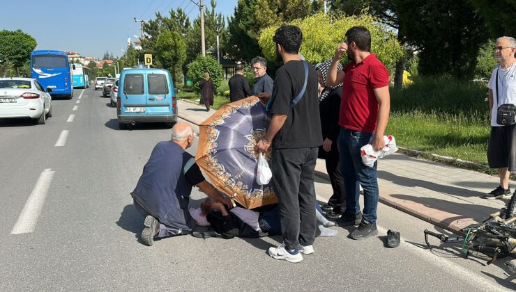 Ağır yaralanan yaşlı adamı güneşten şemsiye ile korudular